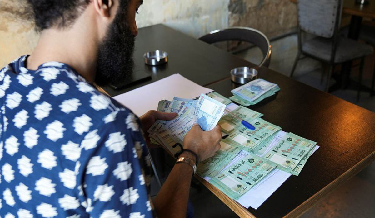 Lebanese carry 'worthless' stacks of cash after currency crash